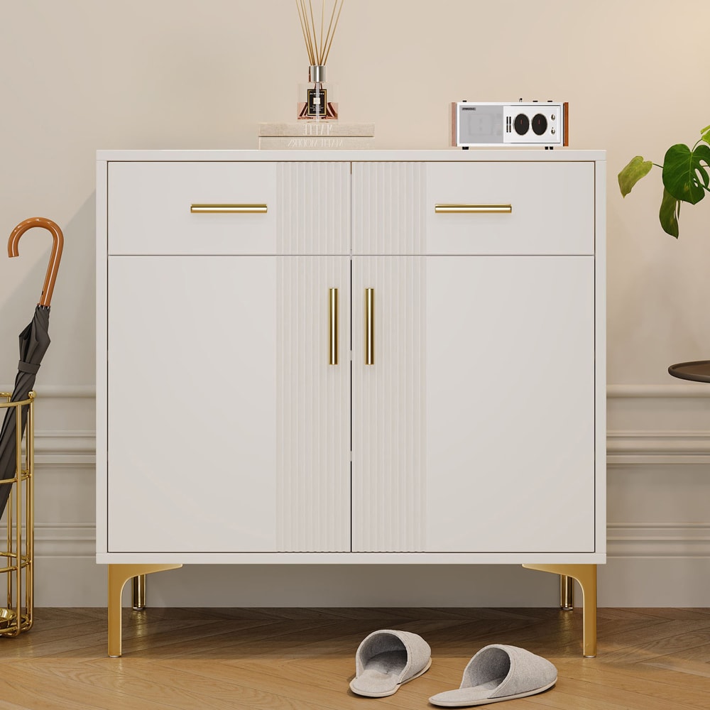 Détail des poignées dorées du buffet URBAN MEUBLE